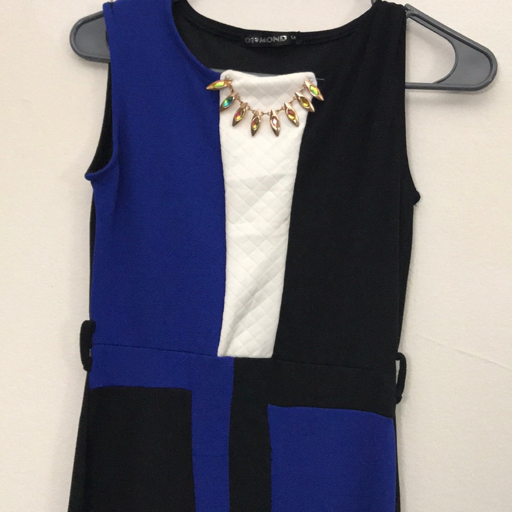Formal royal blue, black, and white dress.
